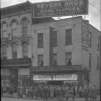 Meyers Brothers (278 West Main and Mill Streets), exterior (Christmas sale); large group gathered in front of store,, 1930.pdf