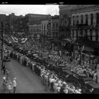 American Legion Parade; band marching down street; partial view of Dan Cohen Shoes,, 1931.pdf