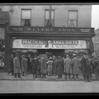 Meyers Brothers (278 West Main and Mill Streets), exterior (Christmas sale); large group gathered in front of store,, 1930 #2.pdf