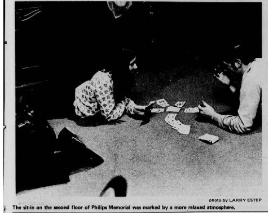 day of sit ins students playing cards vietnam war article.png