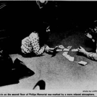 day of sit ins students playing cards vietnam war article.png