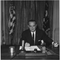 President_Lyndon_B._Johnson_signs__Gulf_of_Tonkin__resolution_-_NARA_-_192484.tif.jpg