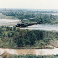 US-Huey-helicopter-spraying-Agent-Orange-in-Vietnam.jpg