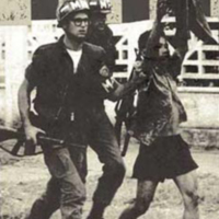 MPs_escort_a_Vietcong_captive_out_of_the_US_Embassy_on_31_January_1968.jpg